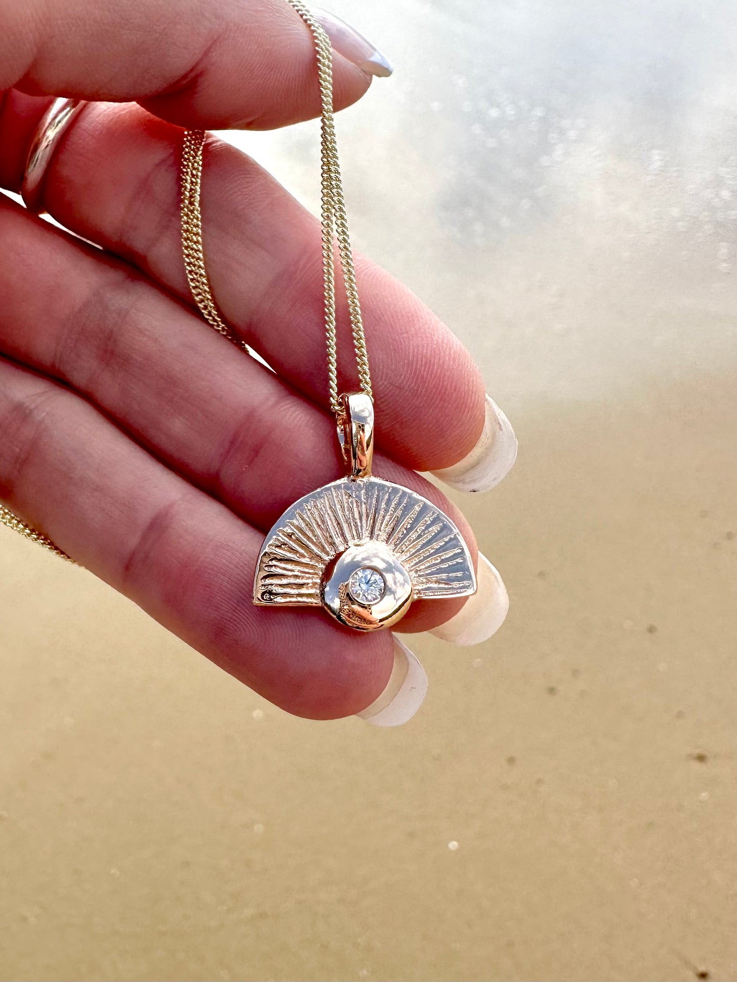 Radiant Sun 9ct Gold Pendant with Natural Diamond