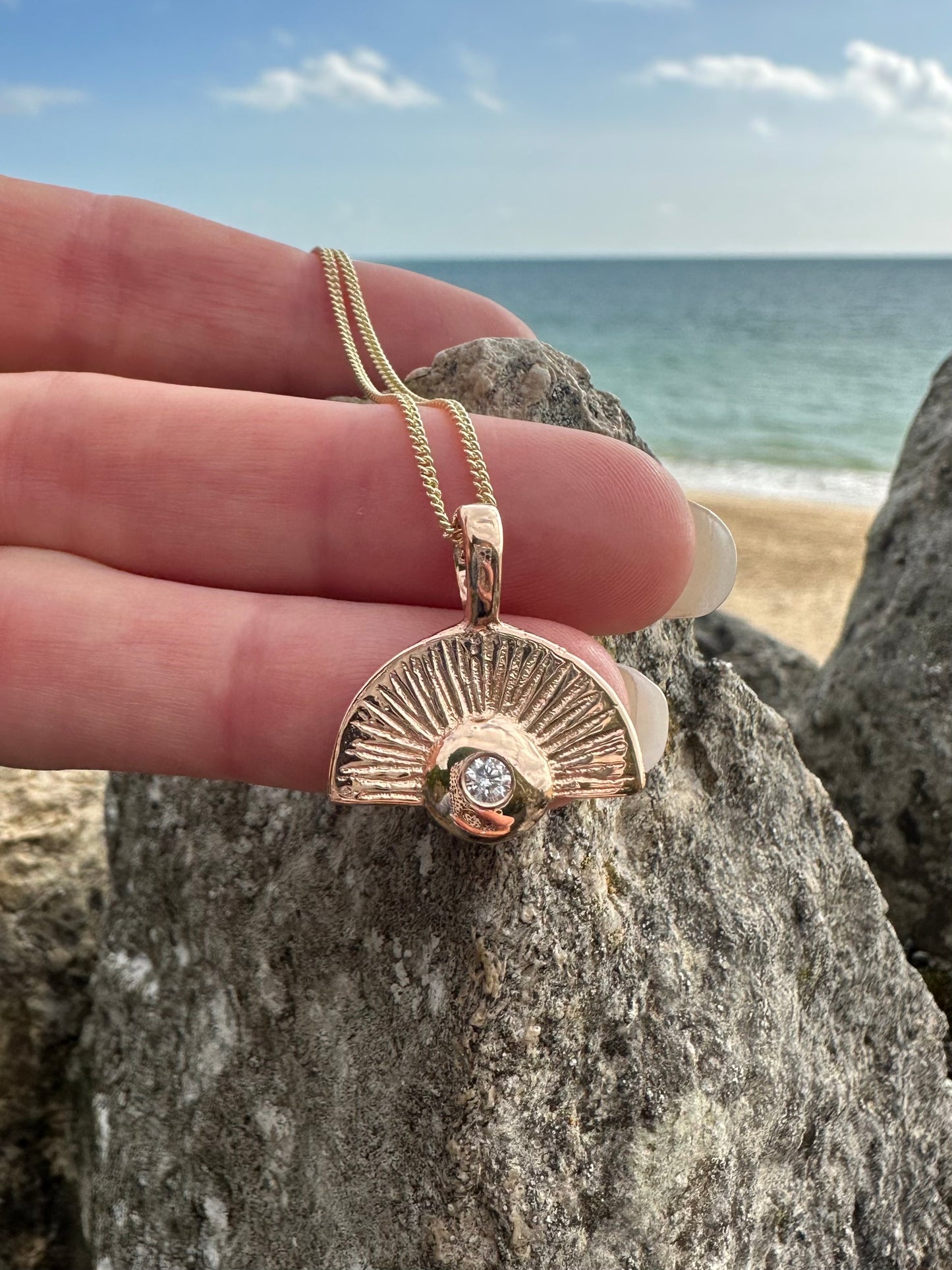 Radiant Sun 9ct Gold Pendant with Natural Diamond